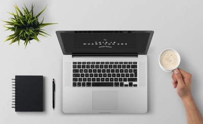 Computer and a coffee