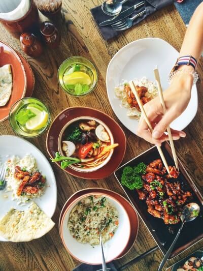 Dinner table with Oriental food