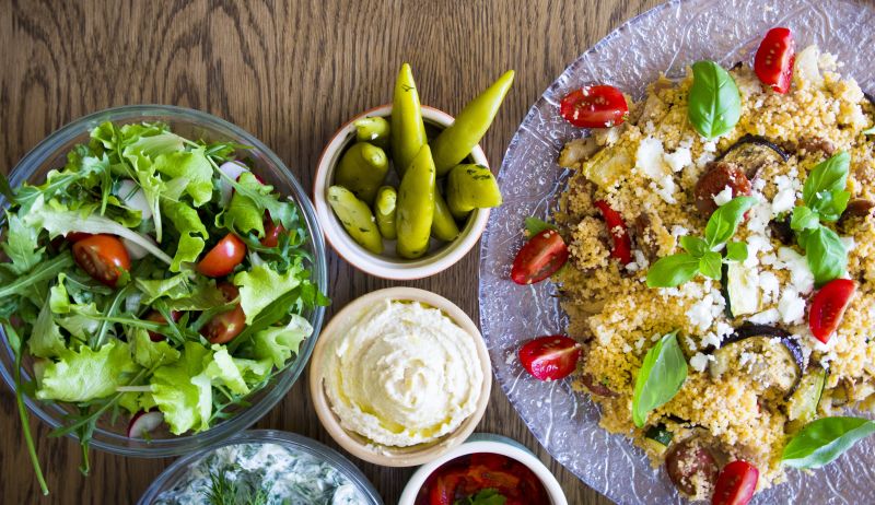 Couscous lunch with salad and pickles