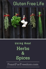 Pinterest mini image - Using real herbs and spices with fresh spices tied nicely and hung on a black rustic wall