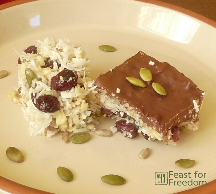 Coconut and nut squares, one that's plain, one that's topped with chocolate