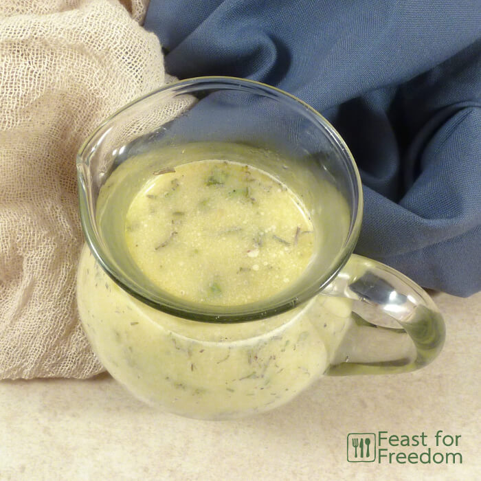 Italian dressing in a small pitcher