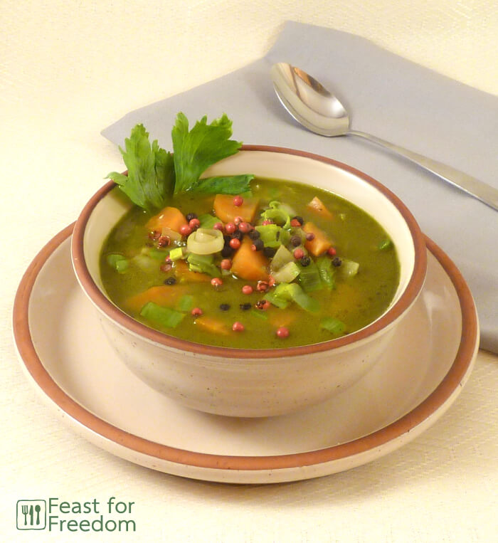 Leek soup in a bowl garnished with parsley