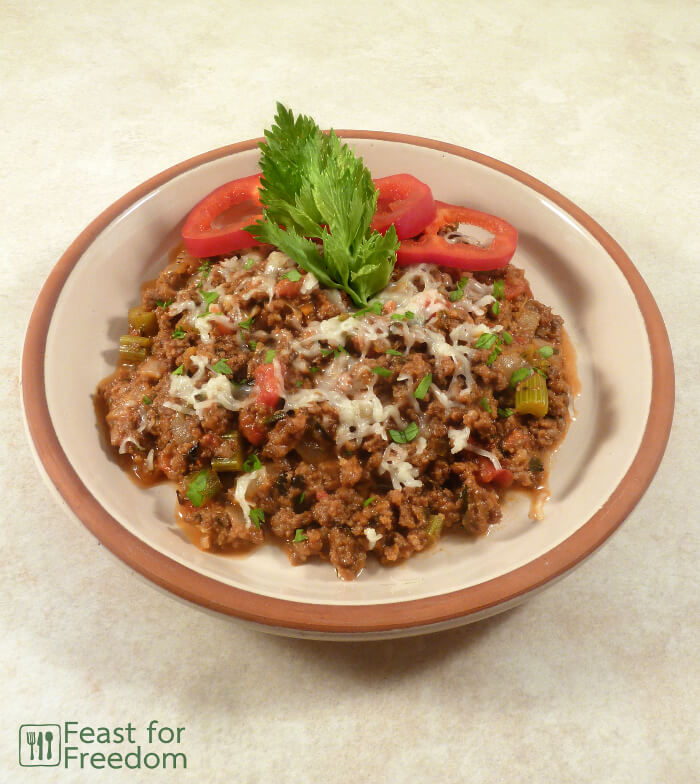 Hamburger, tomato and cheese skillet dinner on a plate