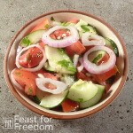 Tomato cucumber salad in a bowl